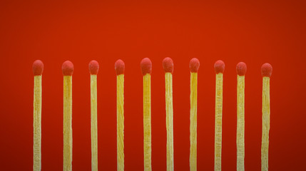 pile of matchsticks arrange in a row
