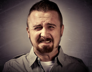 Fototapeta premium Sad unhappy man face.
