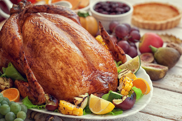 Thanksgiving Turkey dinner on white wooden table with copy space