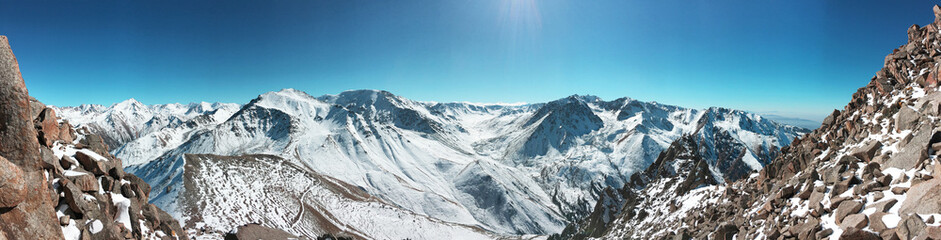 Fototapeta na wymiar Trans-Ili Alatau mountains. Top view from Big Almaty peak.