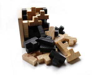 Wooden puzzle blocks on white background