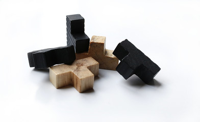 Wooden puzzle blocks on white background