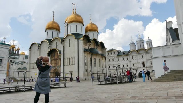 Tourist taking pictures Moscow orthodox cathedral
