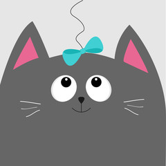 Gray cat head looking at blue bow hanging on thread. Cute cartoon character. Pet baby collection Card. Flat design.