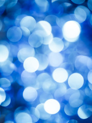 Fototapeta premium niebieskie tło Boże Narodzenie światła bokeh.