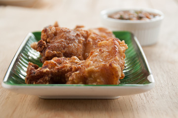 Deep fried pork with spicy sauce
