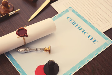 Old notarial wax stamp and documents on table