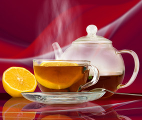 image of cup of tea on a red background closeup