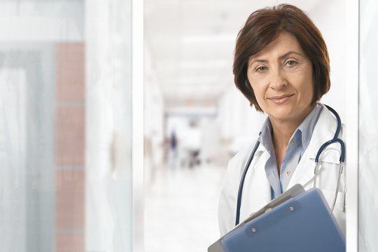 Portrait of senior female doctor at hospital