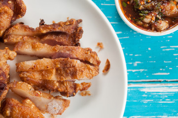 Deep fried pork with spicy sauce