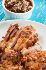 Deep fried pork with spicy sauce