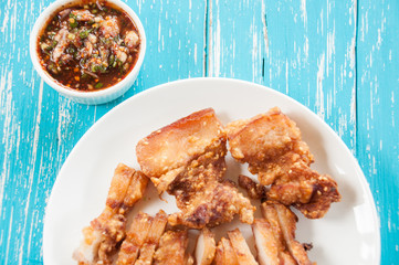 Deep fried pork with spicy sauce