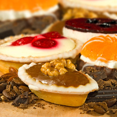 different delicious cakes closeup