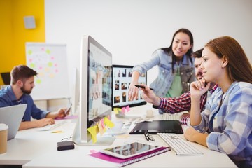 Business people working with computers