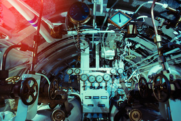 Detailed view of gauges, valves and pipes in old submarine