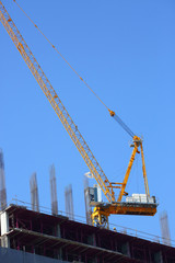 machinery crane working in construction site building