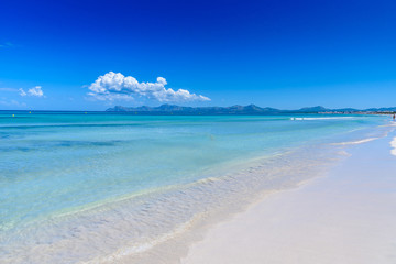 Naklejka premium Pier at Playa Muro - beautiful beach on Mallorca, balearic island of spain