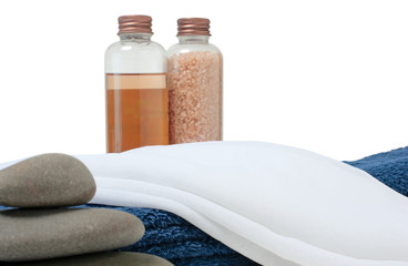 bottle with oil and sea salt in the towel