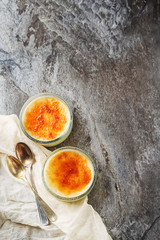 Creme brulee - traditional french vanilla cream dessert with car