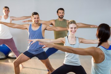 Instructor taking yoga class