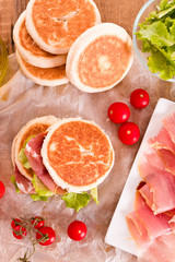 Tigella bread stuffed with ham and lettuce.