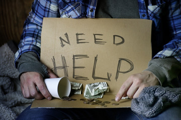 Fototapeta na wymiar homeless man ask help