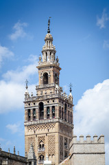 Fototapeta na wymiar Giralda Tower is a famous landmark in the city of Seville, Spain