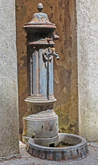 Old rusted  public water tap