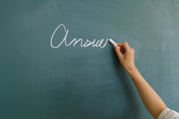 answer written on the chalkboard
