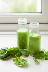 healthy green spinach smoothie with cilantro lime banana ginger