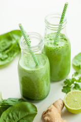 healthy green spinach smoothie with cilantro lime banana ginger
