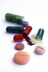 Group of capsule pills on isolated white background