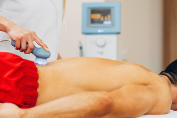Lower back ultrasound therapy