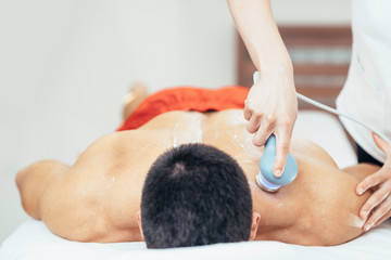 Ultrasound treatment in physical therapy - obrazy, fototapety, plakaty