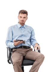 businessman  sitting in  chair and using tablet