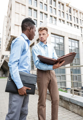 two businessmen  discussing  project