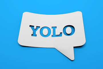 Yolo speech bubble on a blue background