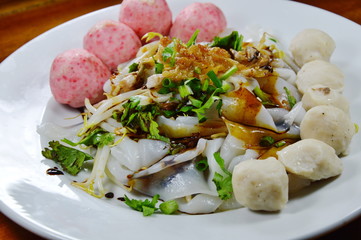 large noodle with pork ball dressing black soy sauce