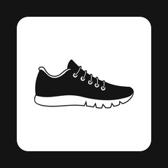 Black sneaker icon in simple style on a white background
