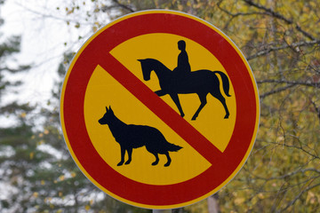 Traffic sign. No dogs allowed and no horse allowed.
