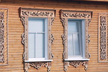 windows with carved architraves