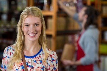 Smiling woman in supermarket