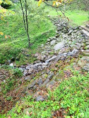 Beautiful park with rocks and stream