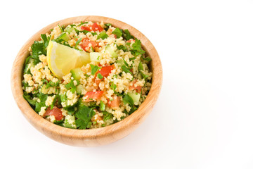 Tabbouleh salad with couscous and vegetables isolated on white background

