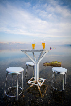 Table and chairs, by the lake
