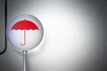 Privacy concept:  Umbrella with optical glass on digital background