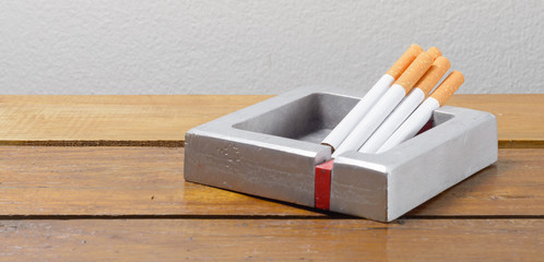 cigarette and ashtray