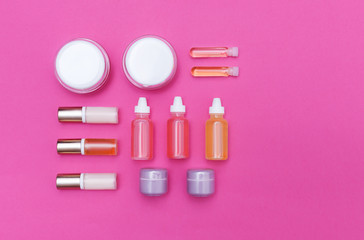 set of cosmetic bottles isolated on a background with space for text
