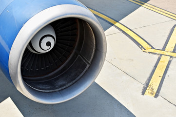 Big airplane engine detail on runway