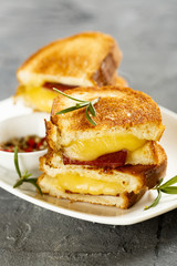Toasts with cheese and sausage